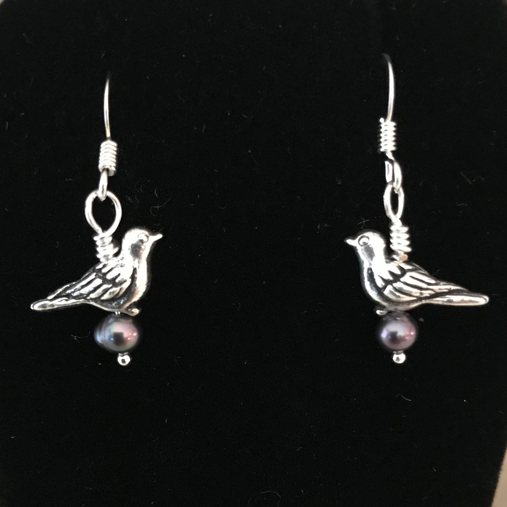 Silver tone bird earrings